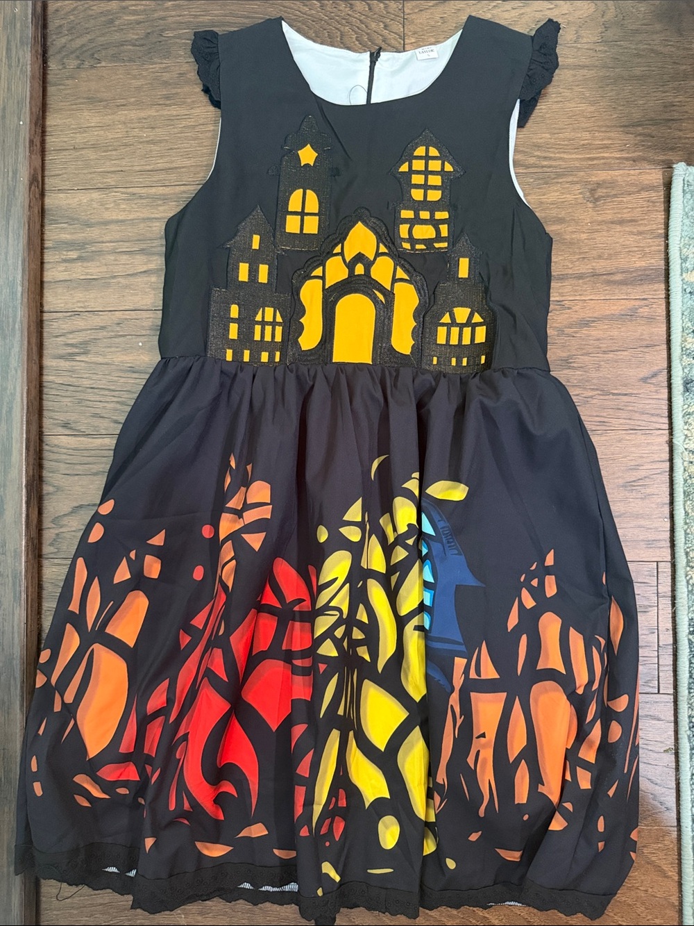 Taylor Black Mini Dress with Yellow, Red, Orange and Blue Accents
